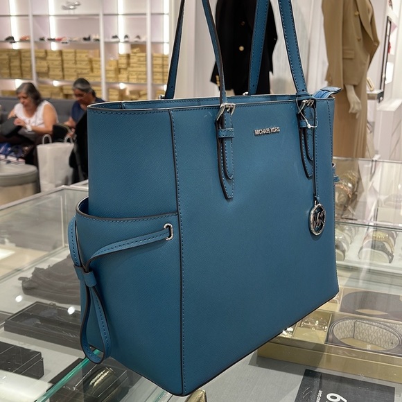 Michael Kors Gilly Large Drawstring Travel Leather Top Zip Tote
 Color: TEAL
NWT - Picture 12 of 16